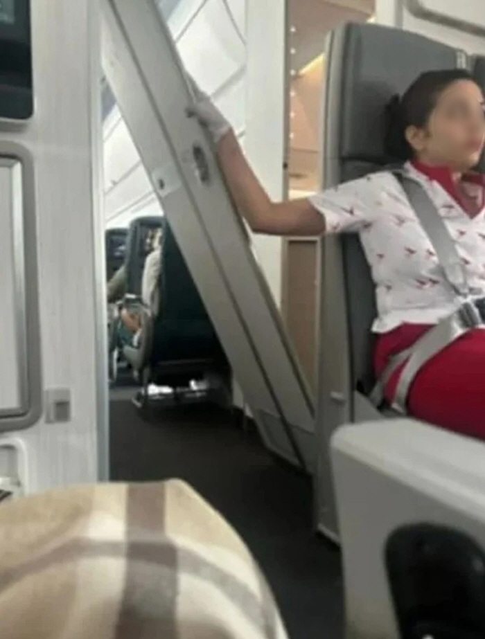 The plane's bathroom door fell, and the flight attendant held him for 16 hours