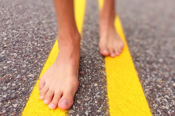 More than 20 middle school students daily who walked barefoot on asphalt under the direction of their homeroom teacher