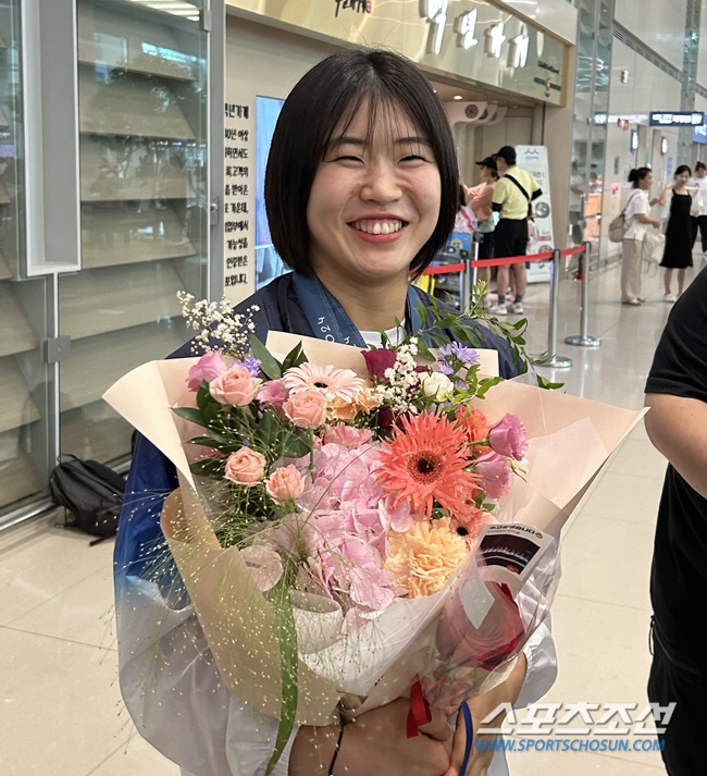 Heo Mi-mi dedicates her Olympic medal to her grandfather's grave