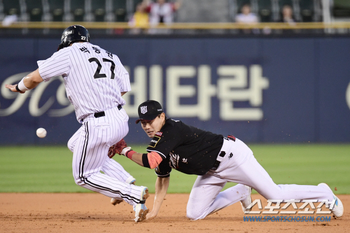 'The ball is alive and moving...' It's an easy double play, but the ball bounces out of the glove, hits the runner and rolls to the outfield. Even 'killer' has no business for mistakes