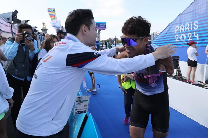  '200 Out of 100!' Paralympic Triathlon, Kim Hwang-tae's completion is the perfect finale of the Iron Man