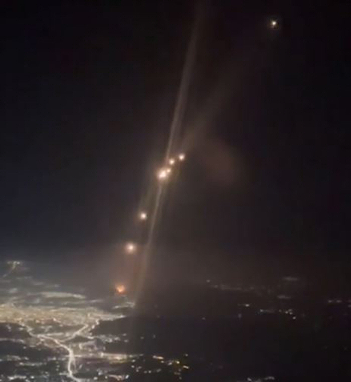 Footage of Iranian missile launch captured on civilian airliner'Almost a major accident'