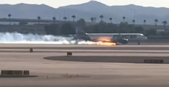 The plane that was making an emergency landing on the runway burst into flames