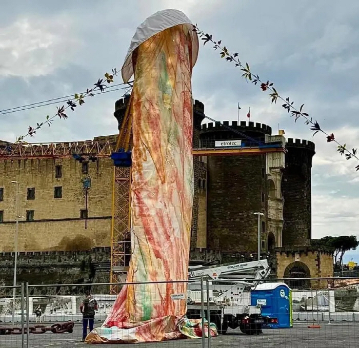 Installation of a sculpture of a male genital in the city center of a ...