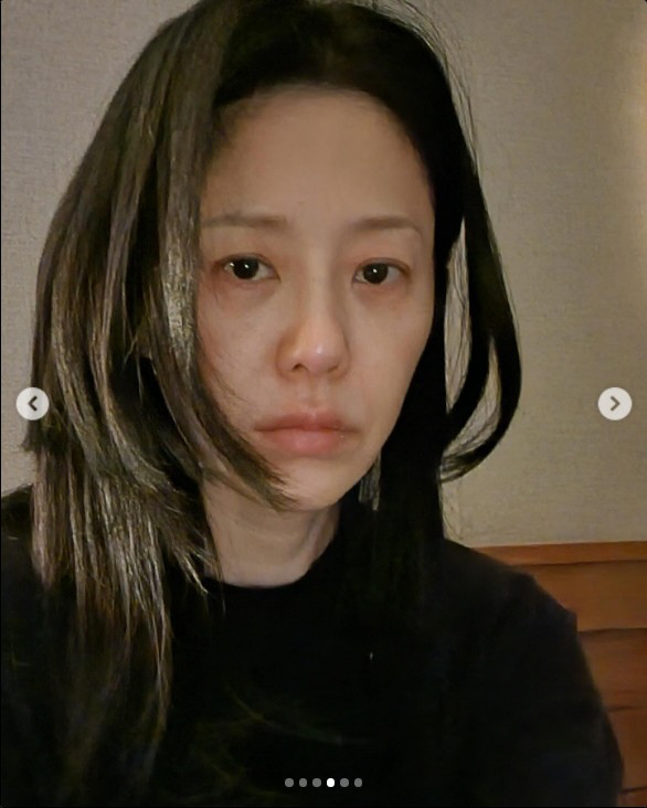 Ko Hyun-jung, with her oily hair and a squishy face. 'Stop filming me'