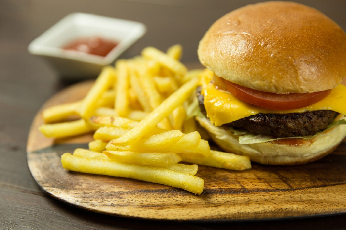 Why was a 12-year-old boy who only ate hamburgers and fries shocked his real name?