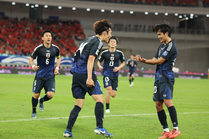 Japan virtually confirmed its advance to the World Cup, winning 3-1 away to China...'0-7 Catastrophe' 中 Revenge Failed