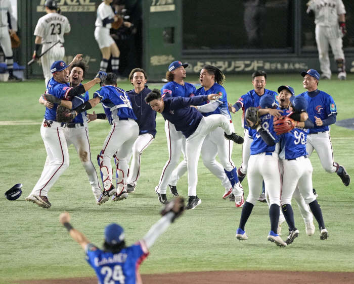 'We can't believe we beat Japan' The whole country made history when Taiwan won the championship.'