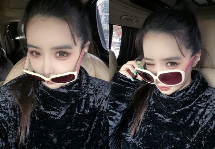 Park Bom, how long have you been on a diet..a face covered with a pair of sunglasses