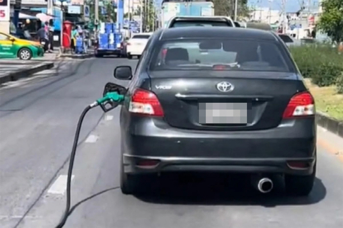 A car that's speeding with a gas pump on. It turns out why