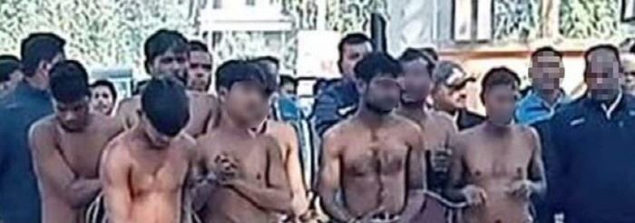 Eight foreign workers marched naked in an attempt to rape a woman in the village